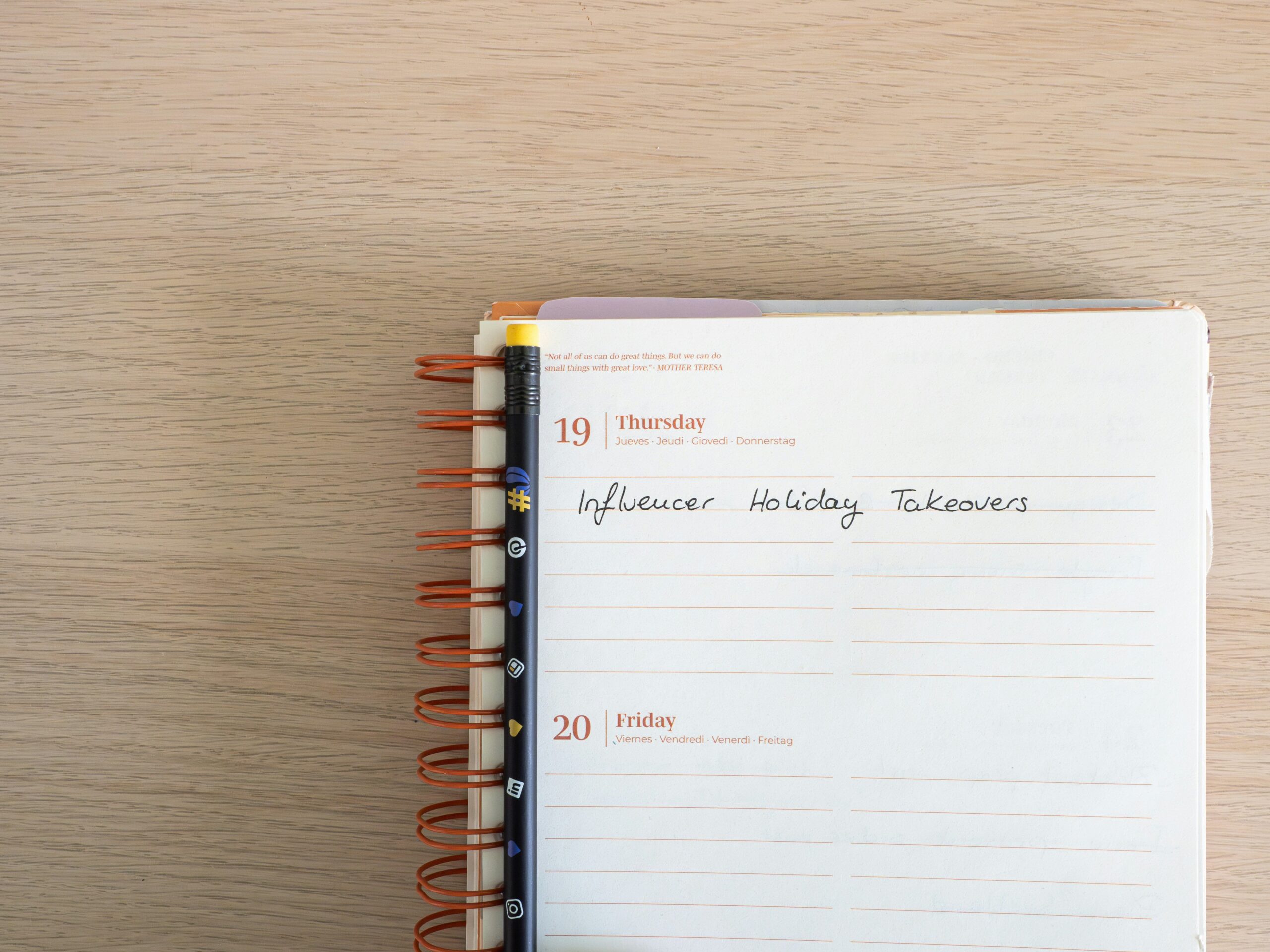 Two people sitting together at a café discussing goals, illustrating partnership in habit accountability.