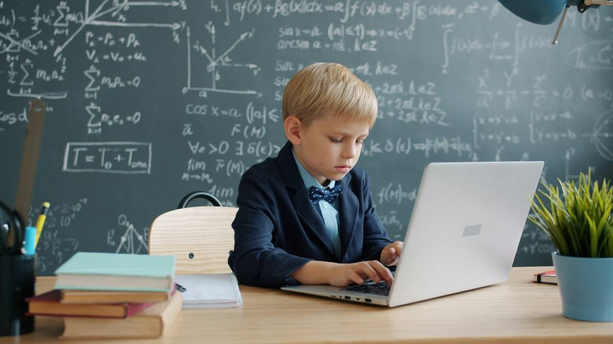 A person meditating at sunrise