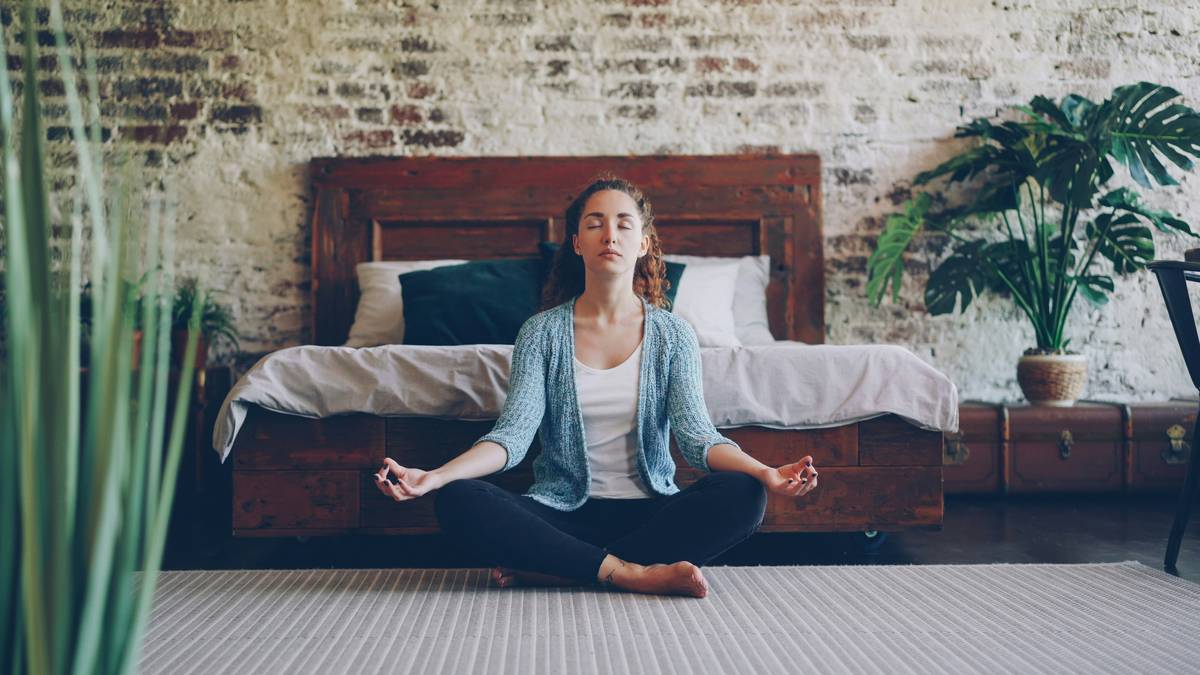 A person practicing mindful breathing in a quiet space