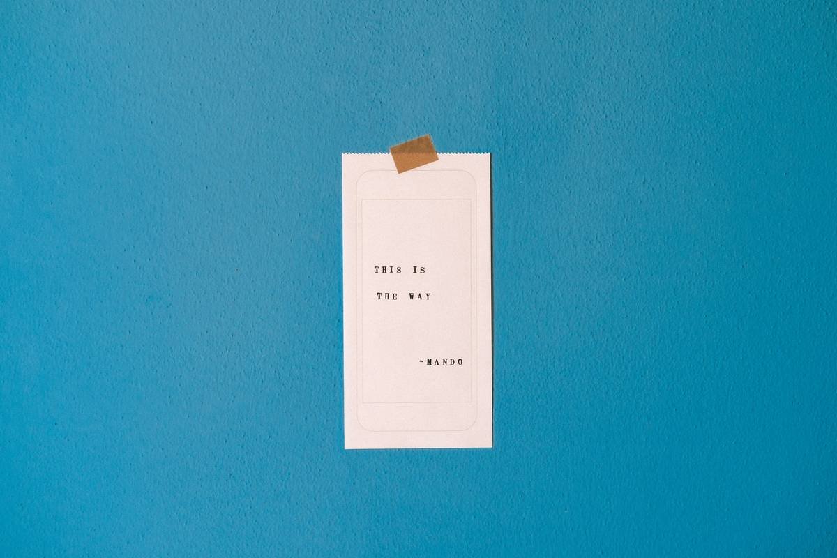 A woman enjoying calm meditation sits cross-legged with eyes closed, contrasting a chaotic multitasking workspace